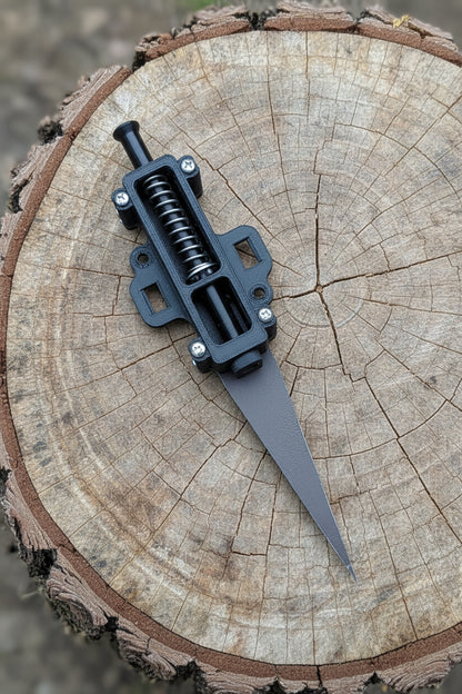 petg perimeter alarm on a tree stump